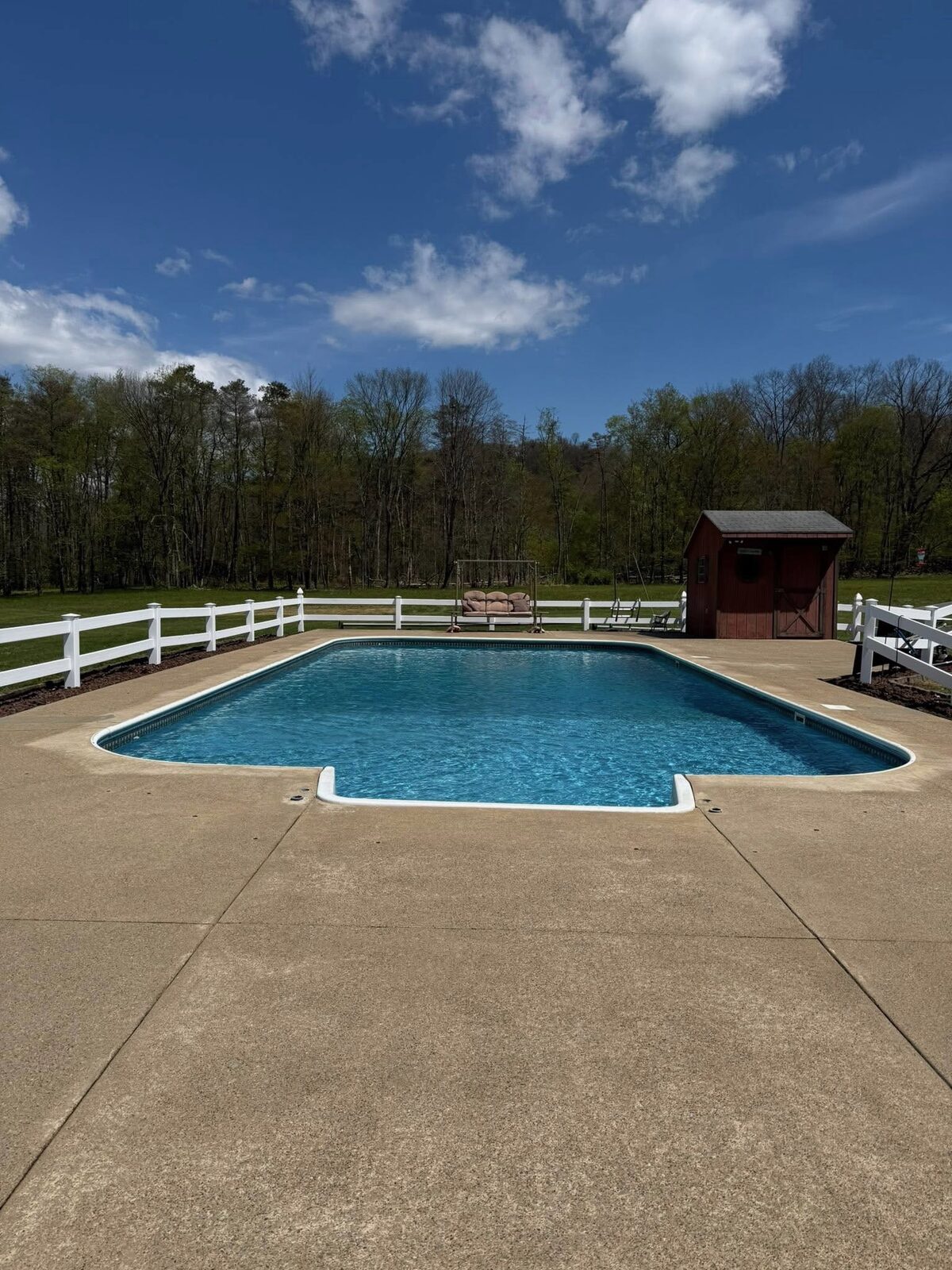 Pool deck after pressure washing — clean concrete